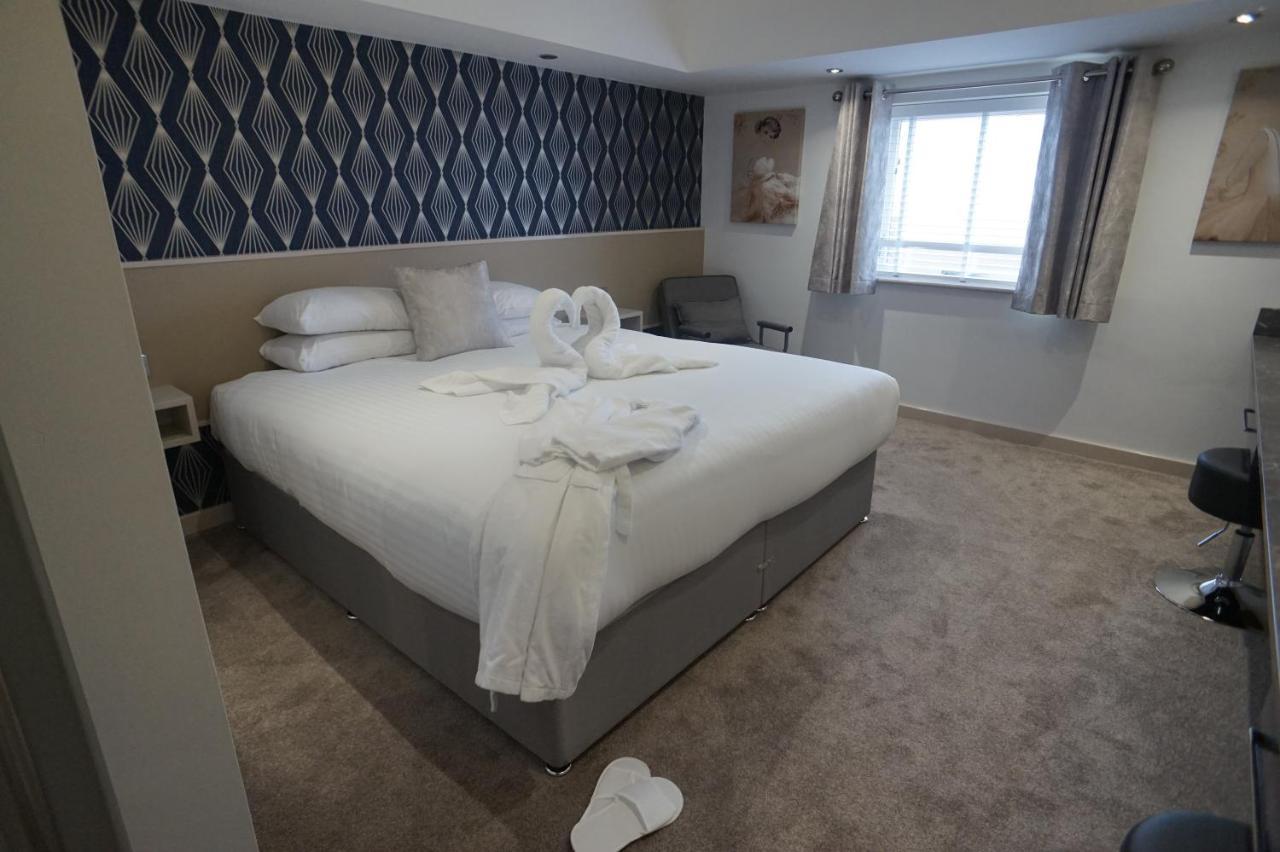 Damon'S Hotel Lincoln Bagian luar foto