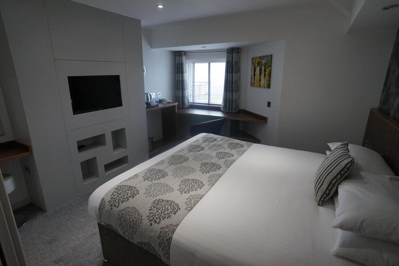 Damon'S Hotel Lincoln Bagian luar foto