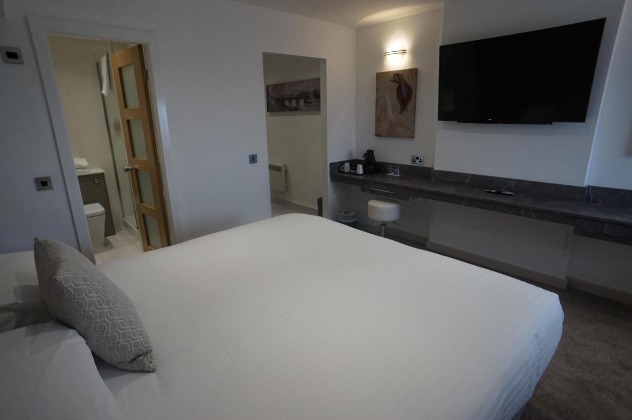 Damon'S Hotel Lincoln Bagian luar foto