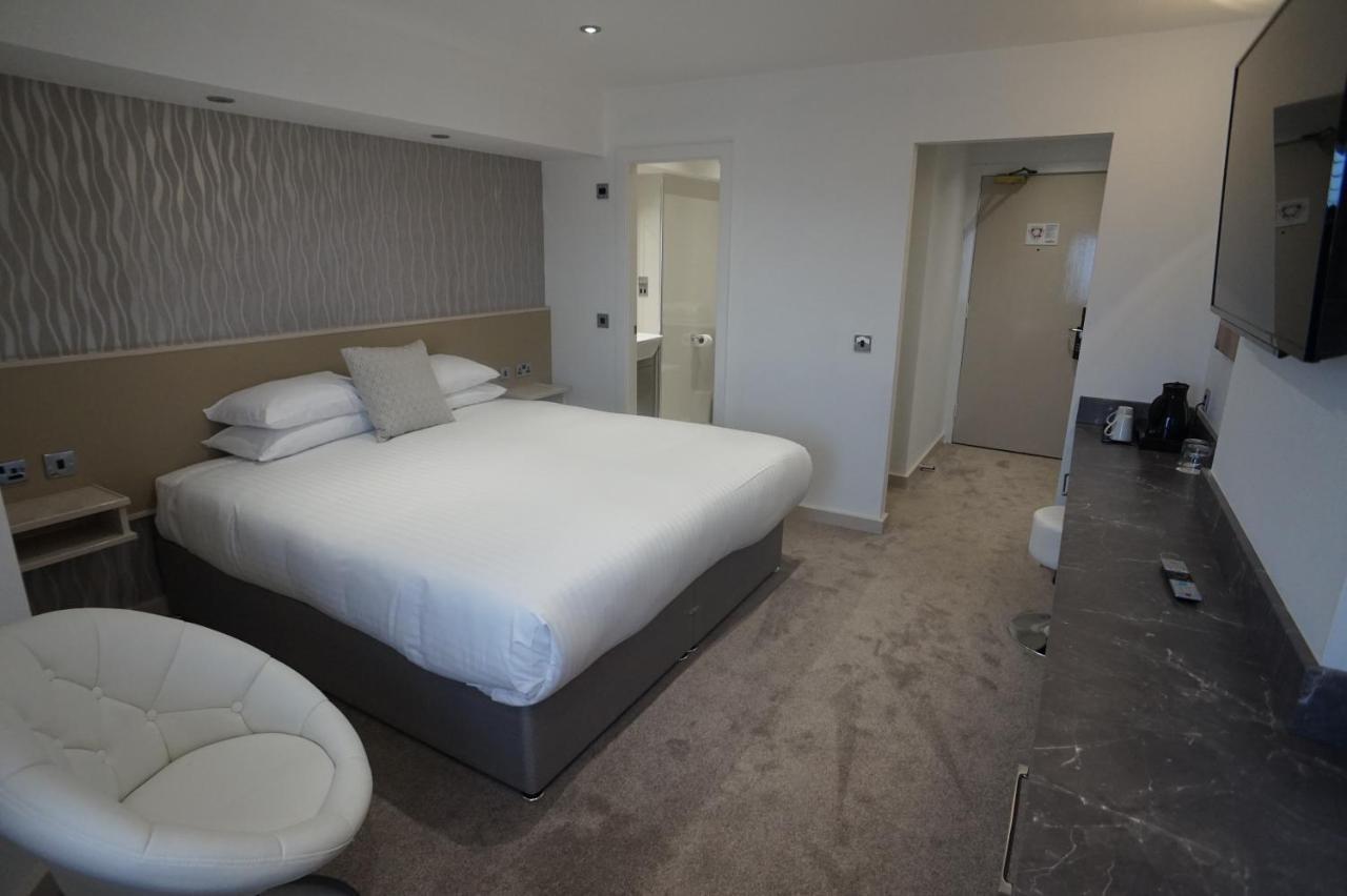 Damon'S Hotel Lincoln Bagian luar foto