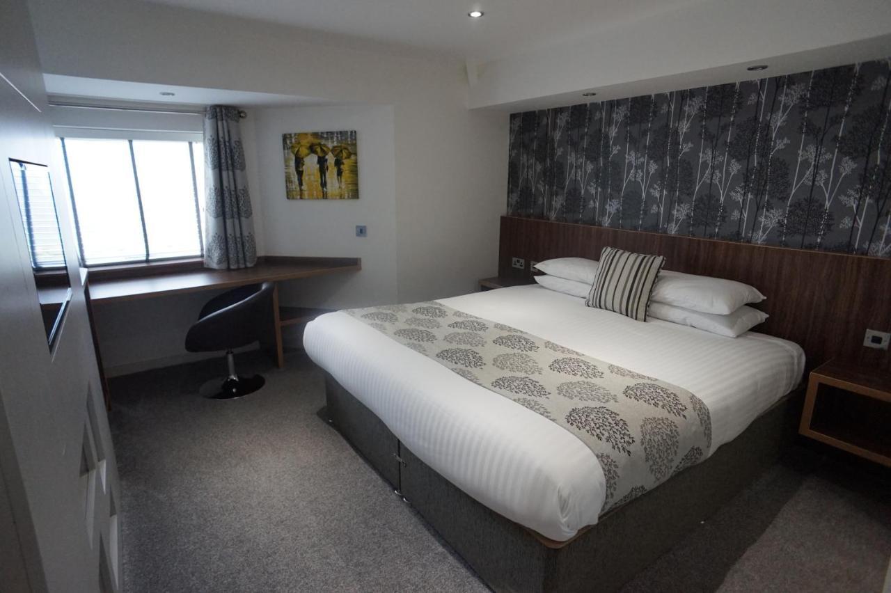 Damon'S Hotel Lincoln Bagian luar foto