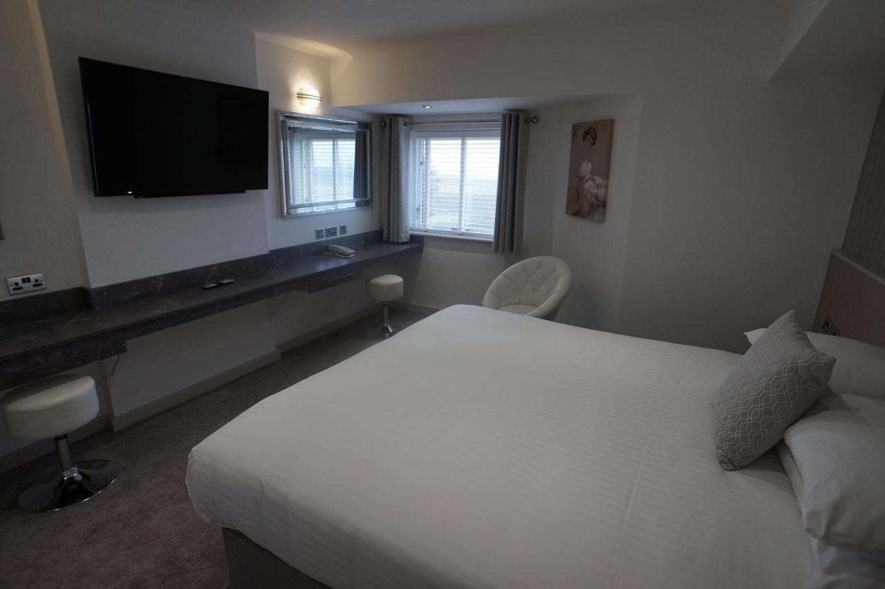 Damon'S Hotel Lincoln Bagian luar foto