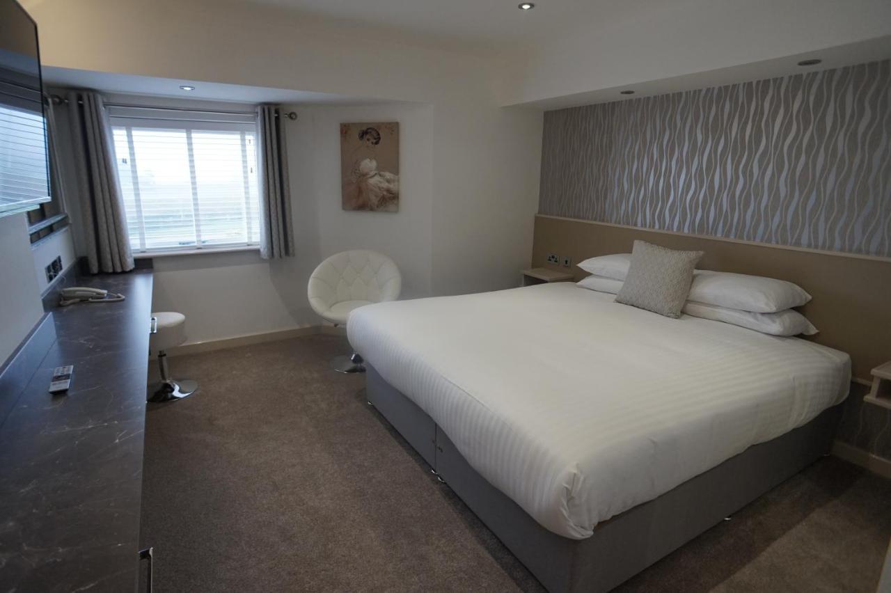 Damon'S Hotel Lincoln Bagian luar foto