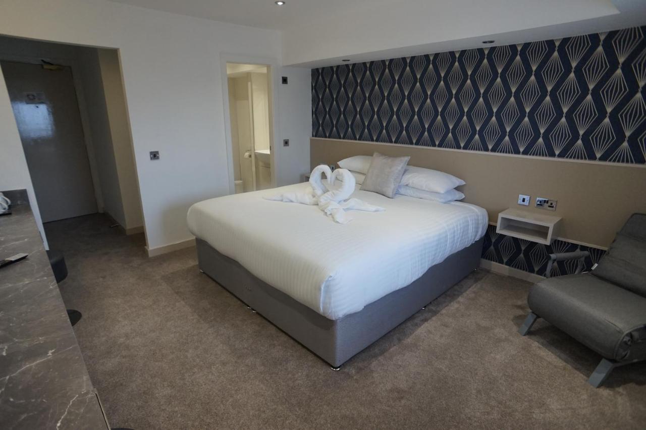 Damon'S Hotel Lincoln Bagian luar foto
