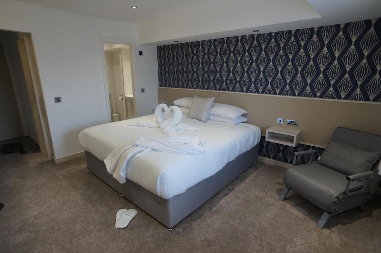 Damon'S Hotel Lincoln Bagian luar foto
