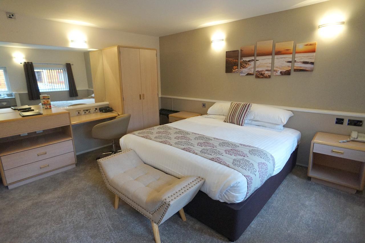 Damon'S Hotel Lincoln Bagian luar foto