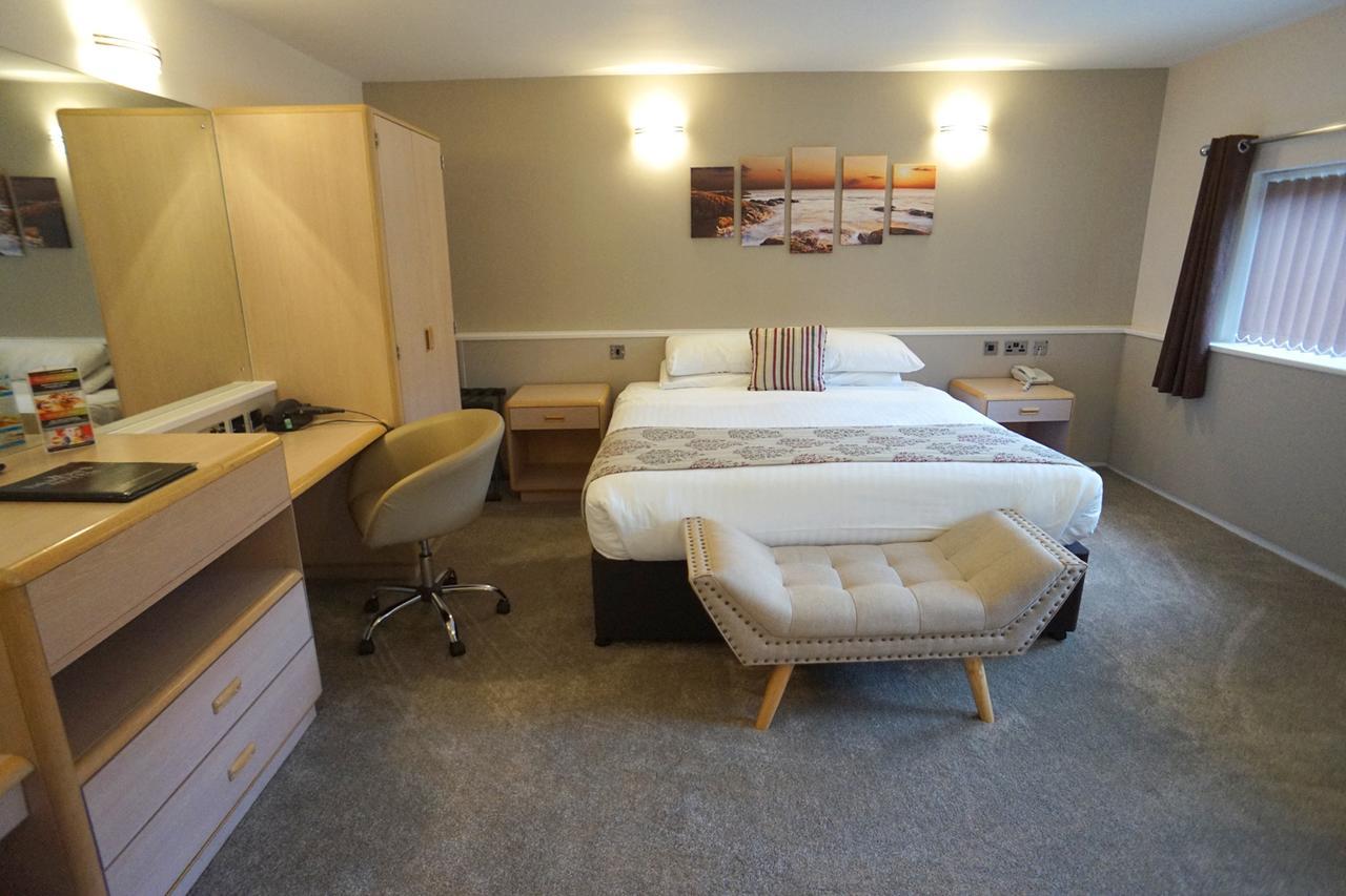Damon'S Hotel Lincoln Bagian luar foto