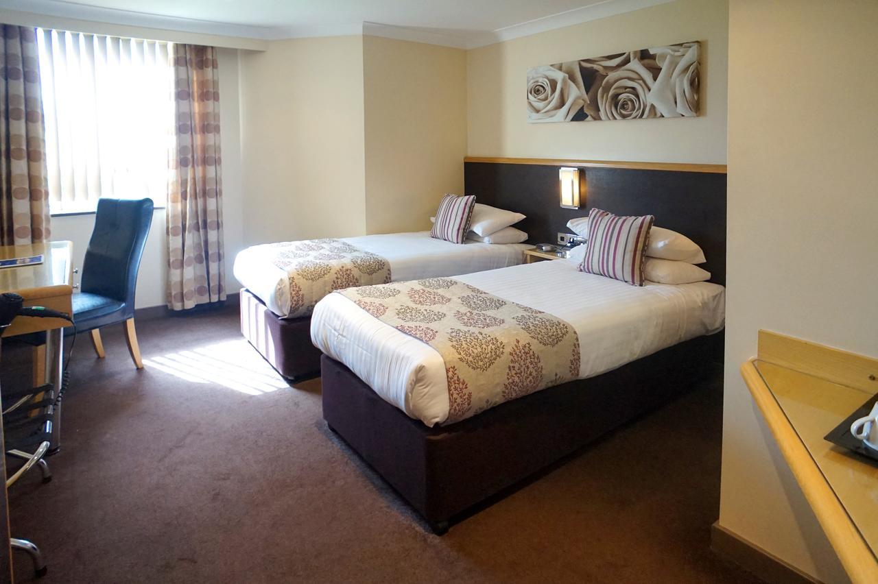 Damon'S Hotel Lincoln Bagian luar foto