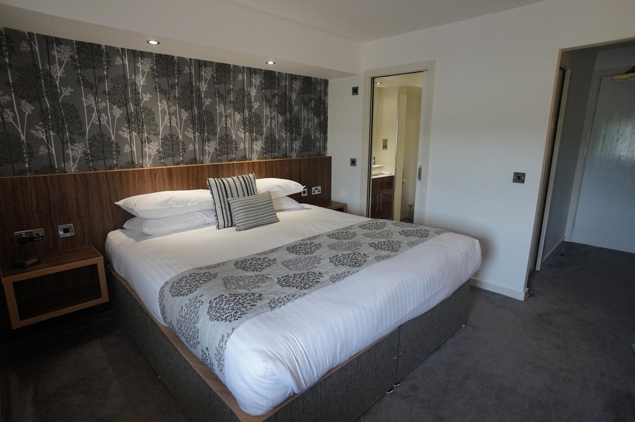 Damon'S Hotel Lincoln Bagian luar foto