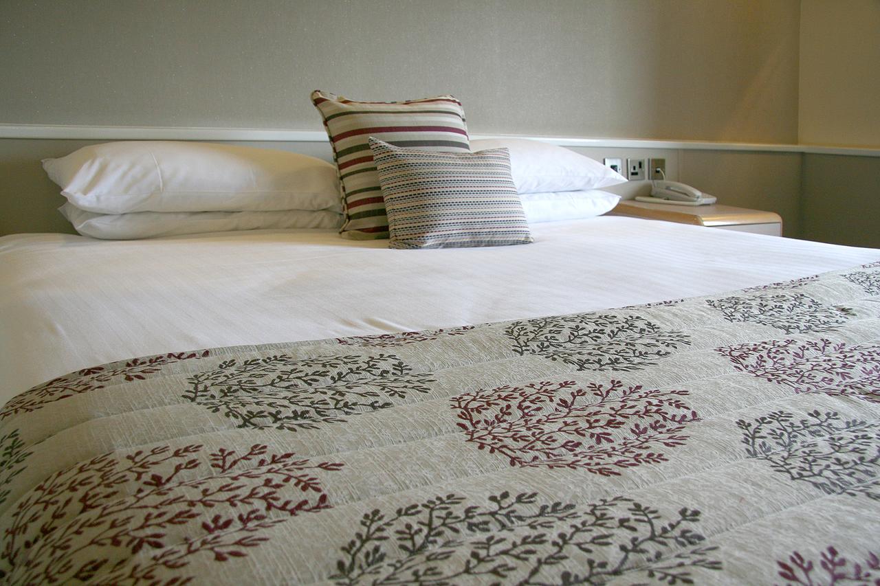 Damon'S Hotel Lincoln Bagian luar foto