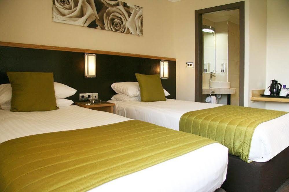 Damon'S Hotel Lincoln Bagian luar foto