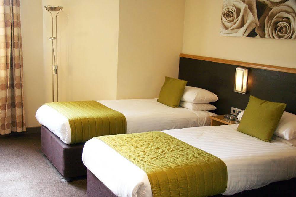 Damon'S Hotel Lincoln Bagian luar foto